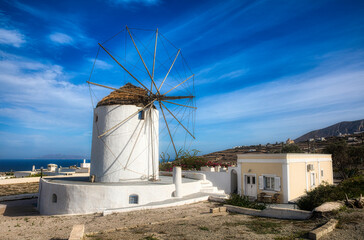 Fototapeta na wymiar Windmill in the Village of Vothonas on the Beautiful Island Santorini, Greece
