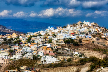 View of the Beautiful and Colorful Village of Pyrgos Kallistis on Santorini, Greece