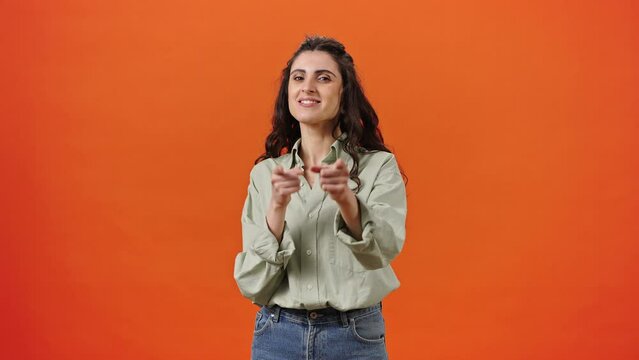 Hispanic young woman clapping hands, applauding and pointing fingers looking at camera