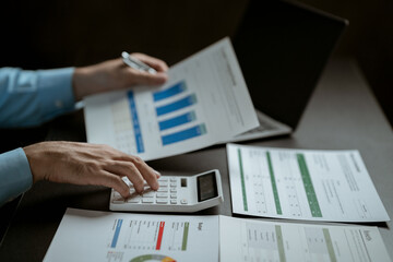 portrait of a man
Working on tablet computer in modern office make account analysis report Real estate investment information, financial and tax system concept