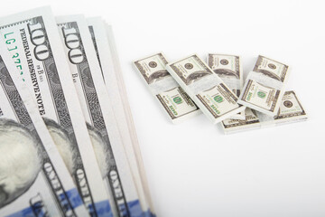 inflation in the USA, dollar bills and small bundles of money nearby, a decrease in the cost of...