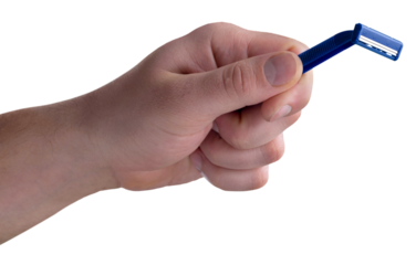 Human holds a classic plastic razor