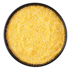 Corn grits in black round plate, transparent background, top view, close-up