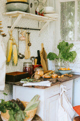 veranda of country village house with vegetables and chanterelle mushrooms on wooden table, eco-friendly food from garden, autumn harvesting