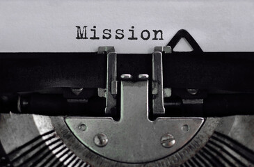Text Mission typed on retro typewriter