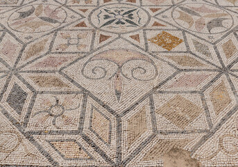 Fototapeta na wymiar mosaic of the stone, roman ruins of italica, seville