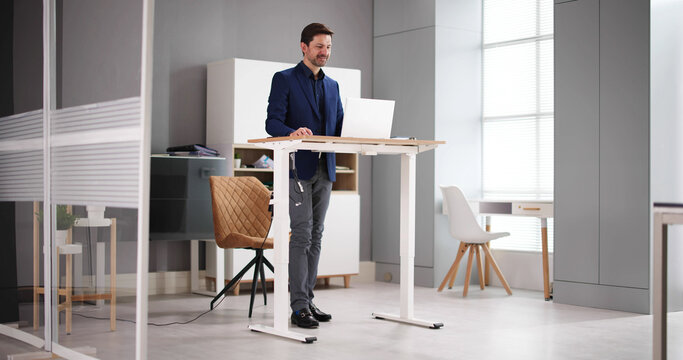 Adjustable Height Desk Stand In Office