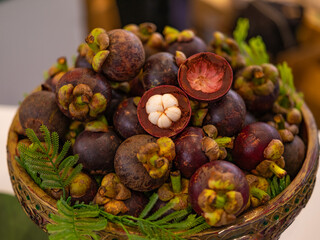 Mangostan Tropical Fruits in the basket on Raw Eating vegetarian Concept Summer Time local food product of Thailand.
