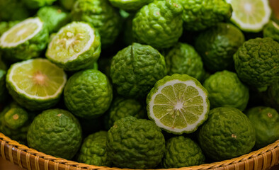 Kafir Lime or Citrus trifoliata. Aromatic spices at Balinese cooking. wellness and food concept.