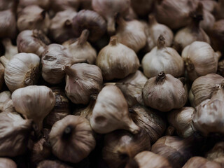 Black garlic clove background
