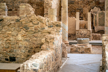 Archaeological area of ​​the Roman forum of El Molinete, Cartagena, Spain with columns and cobblestone streets