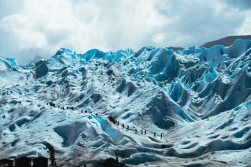 Foto auf Acrylglas People are walking on top of the Perito Moreno glacier in Argentine Patagonia. © Funplore