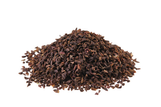 Pile of dried Syrian rue (Peganum harmala), isolated on white background