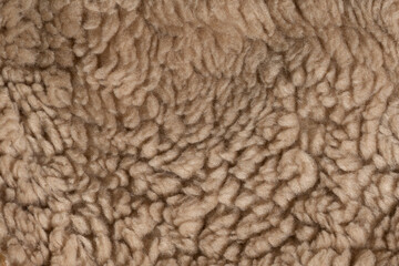 Beige wool texture background. plush. mohair. fur