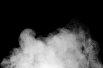 Fragments of abstract white smoke isolated on black background. steam cloud close up