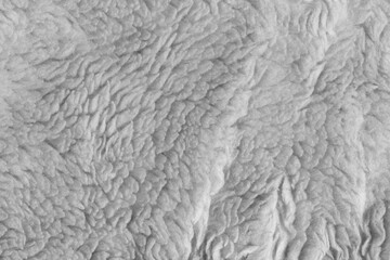 White wool texture background. plush. mohair. gray fur