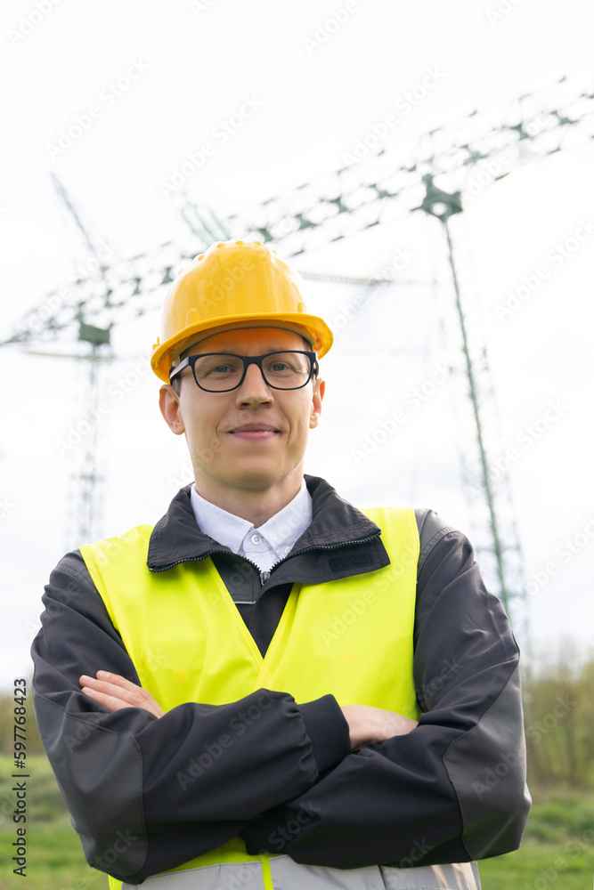 Poster Engineer on a background of power line tower	