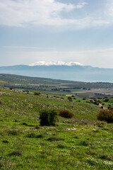 Mount Hermon covered with snow, view from the southwest with Kedesh Valley in the foreground