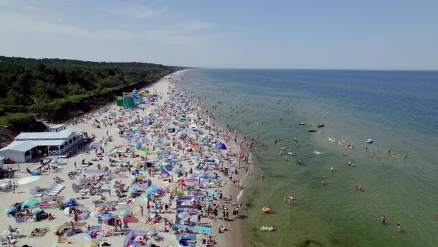 Aerial View of Crowded Beach in Krynica Morska on a Sunny Summer Day