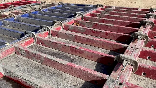large formwork board connected by clamps from several boards
