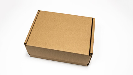 Brown cardboard box isolated on white background. Clipping path included.