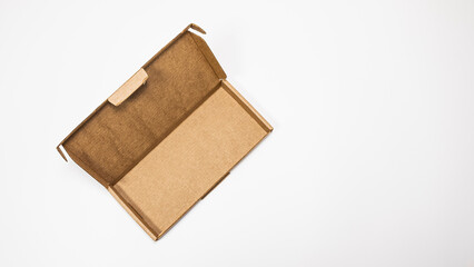 Brown cardboard box isolated on white background. Clipping path included.