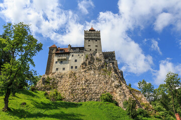 Fototapeta na wymiar View of the famous Bran Castle (Dracula's Castle) in the village of Bran. Transylvania. Romania.Is one of the best preserved medieval castles in Romania.