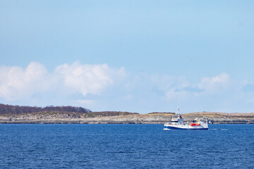 Fototapeta na wymiar Fishing Vessel VIKAFJORD built in 1990,Here passing Brønnøysund,Helgeland coast,Norvay