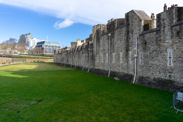 Interior of the Tower of London, with the courtyards and the central building, on a sunny day.