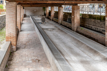 An ancient public wash house in Bolsena, Italy
