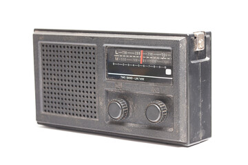 old transistor radio isolated on white