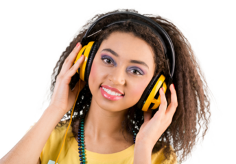 Young woman listening to music in modern headphones
