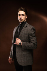 male portrait, photo studio, male photo session, brown background, blurred background, handsome man