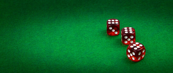Wide view, Dice on green casino cloth, gambling background concept