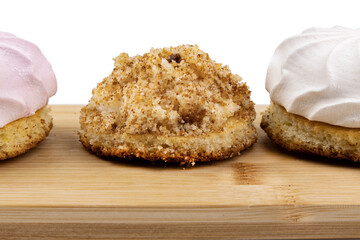 Cakes on kitchen board, isolated on white