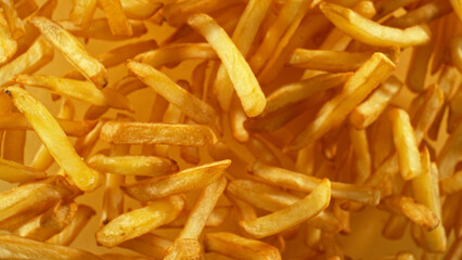 French fries - fried potatoes flying.