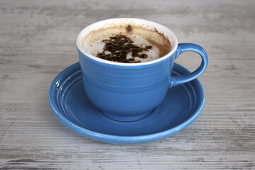 Blue Cappuccino Cup on Grey Table