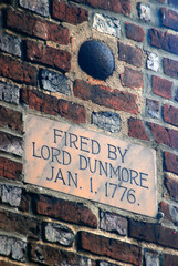 A historic marker denotes a cannonball lodged in the brick wall of St Pauls Church in Norfolk...