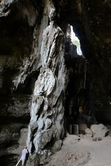 The atmosphere at Batu Cermin, one of the tourist destinations in Labuan Bajo, East Nusa Tenggara, Indonesia. There are caves with stalagmites and stalactites and arid conditions around them.
