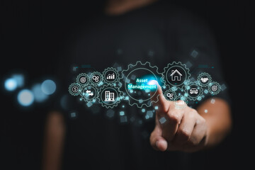 Virtual screen displays an asset management button, representing the use of business technology and the internet to manage and optimize company assets.