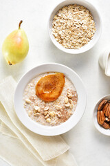 Oat porridge with caramelized pear and peanut