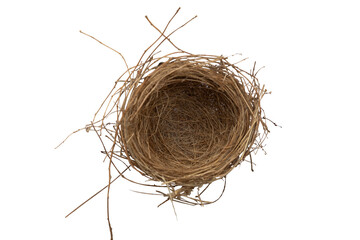 Obraz premium Empty bird nest isolated on white background. Top view. Clipping path