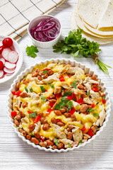 chicken, pinto beans, tomatoes, cheese, top view