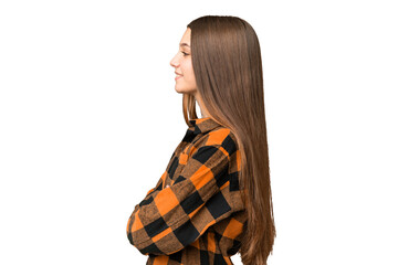 Teenager girl over isolated chroma key background in lateral position