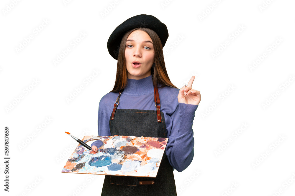 Sticker Young artist man holding a palette over isolated chroma key background intending to realizes the solution while lifting a finger up