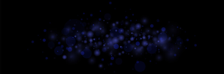 Bokeh particles, abstract background with shiny dust on black background.