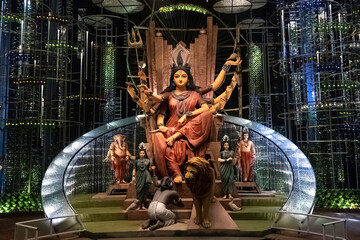 Goddess Durga devi idol decorated at puja pandal in Kolkata, West Bengal, India. Durga Puja is the...