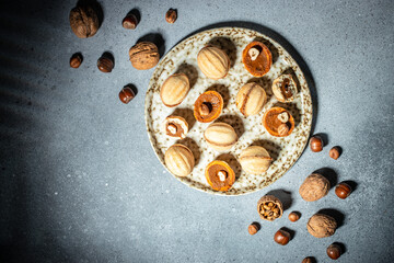 Tasty walnut shaped cookies with boiled condensed milk, Food recipe background. Close up