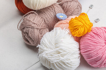 A set of colorful clew of thread for knitting and special craft tools. Handmade, hobby concept