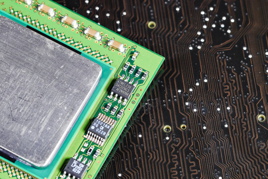 Close up of High performance CPU or central processor unit on electronic board background.